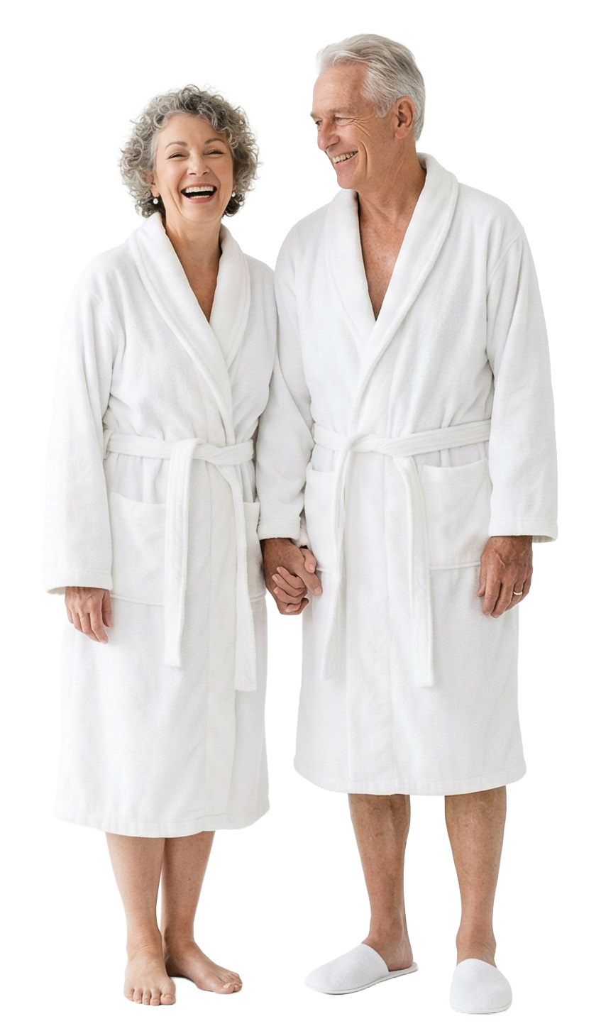 Happy senior couple in bathrobes